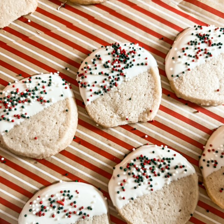 Chocolate dipped shortbread cookies with holiday sprinkles