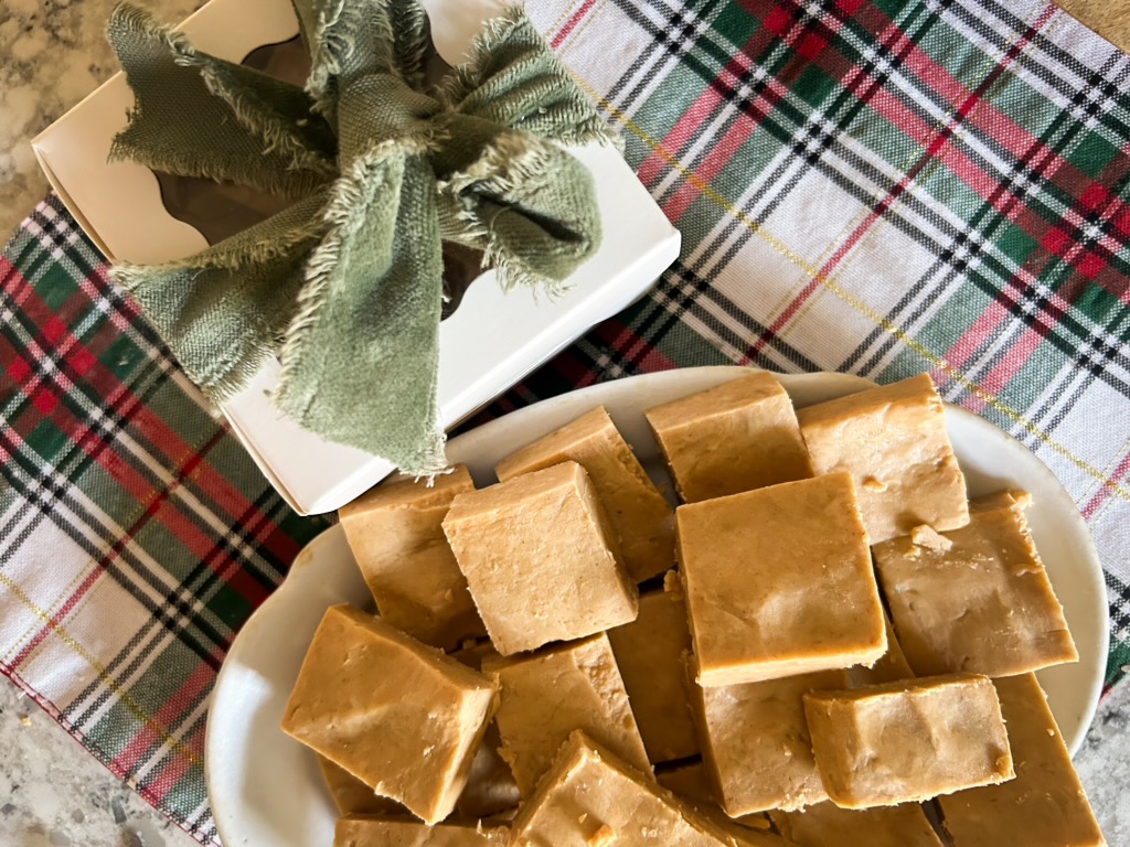 4 ingredient peanut butter fudge with powdered sugar and goodie box packaging for christmas gifts