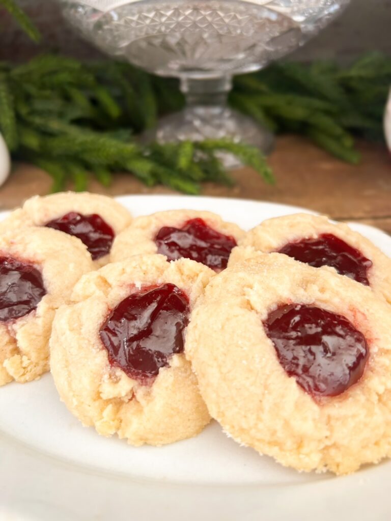 raspberry thumbprint cookies made with shortbread dough.