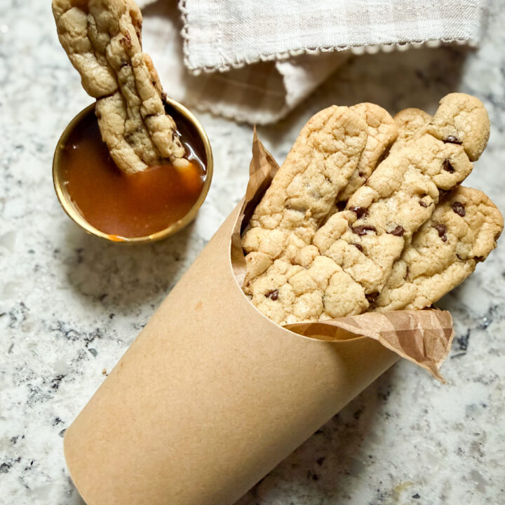 chocolate chip cookie fries in a fry container and served with homemade caramel sauce