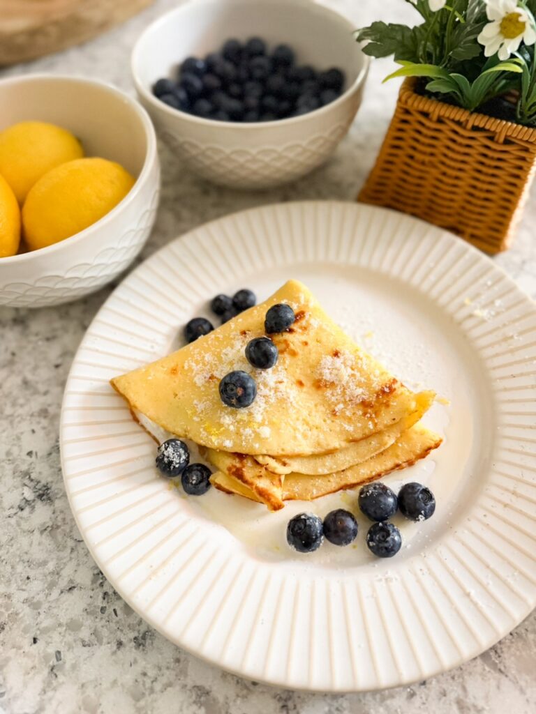 lemon sugar crepes topped with blueberries